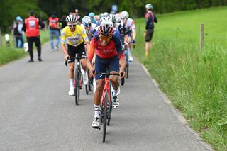 Egan Bernal leads the peloton on a mid-race climb at the final stage of the Tour de Romandie