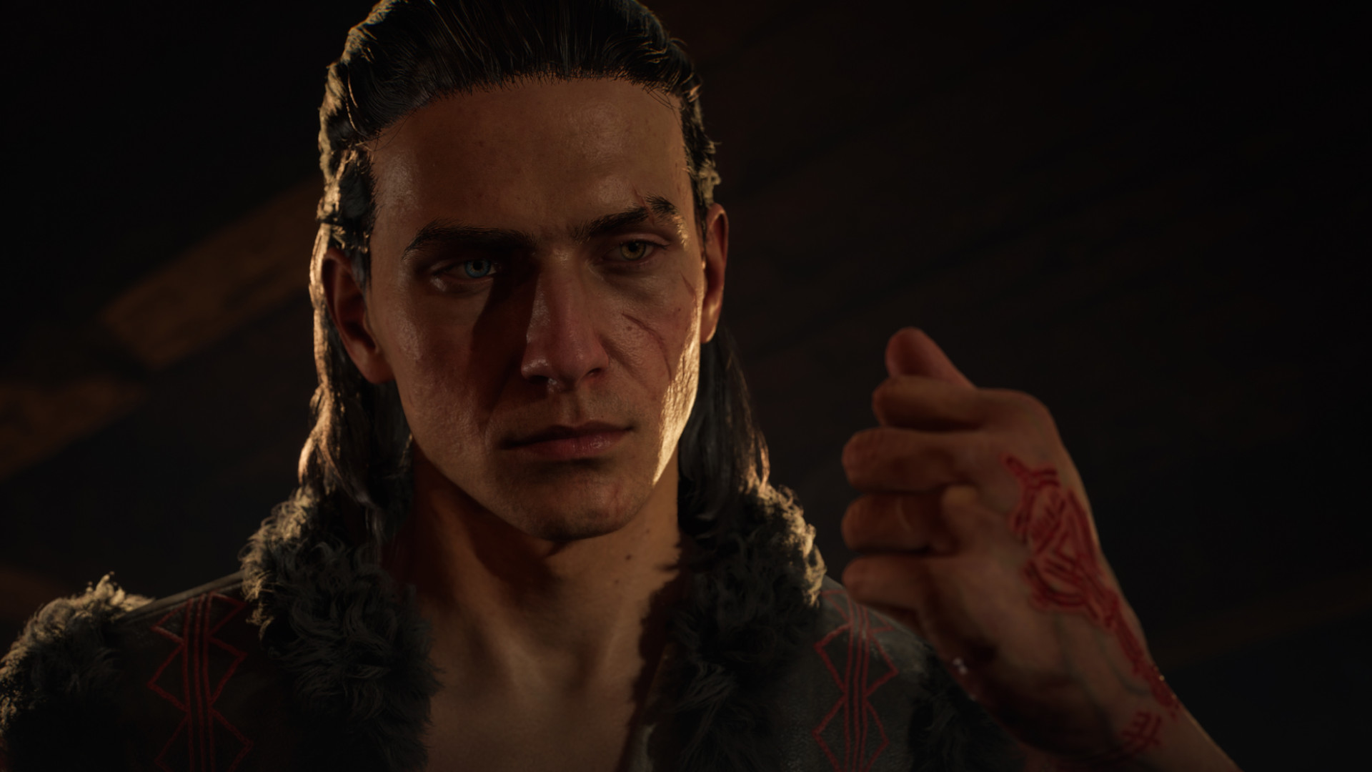 A crop of Coen looking at his closed fist in The Blood of Dawnwalker