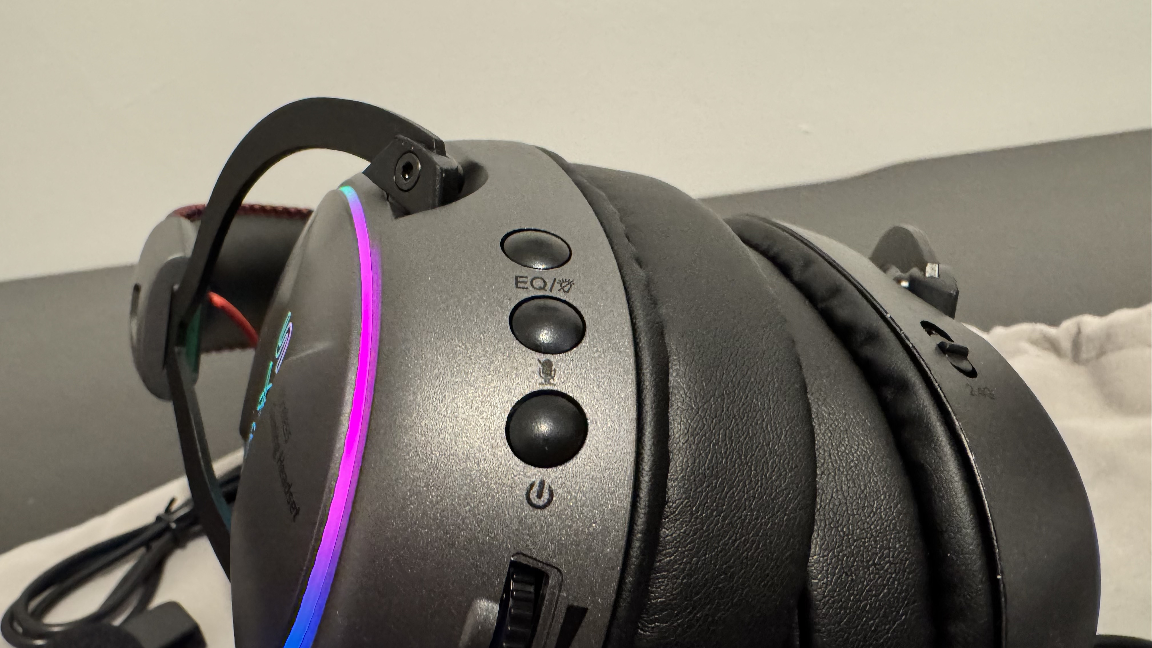 The OXS Storm G2 gaming headset on a black table