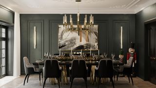 dark green interior room with white and gold chandelier over table