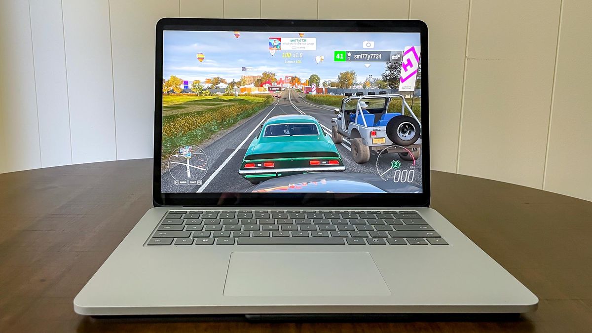 Microsoft Surface LAptop Studio ona table playing forza horizon 4