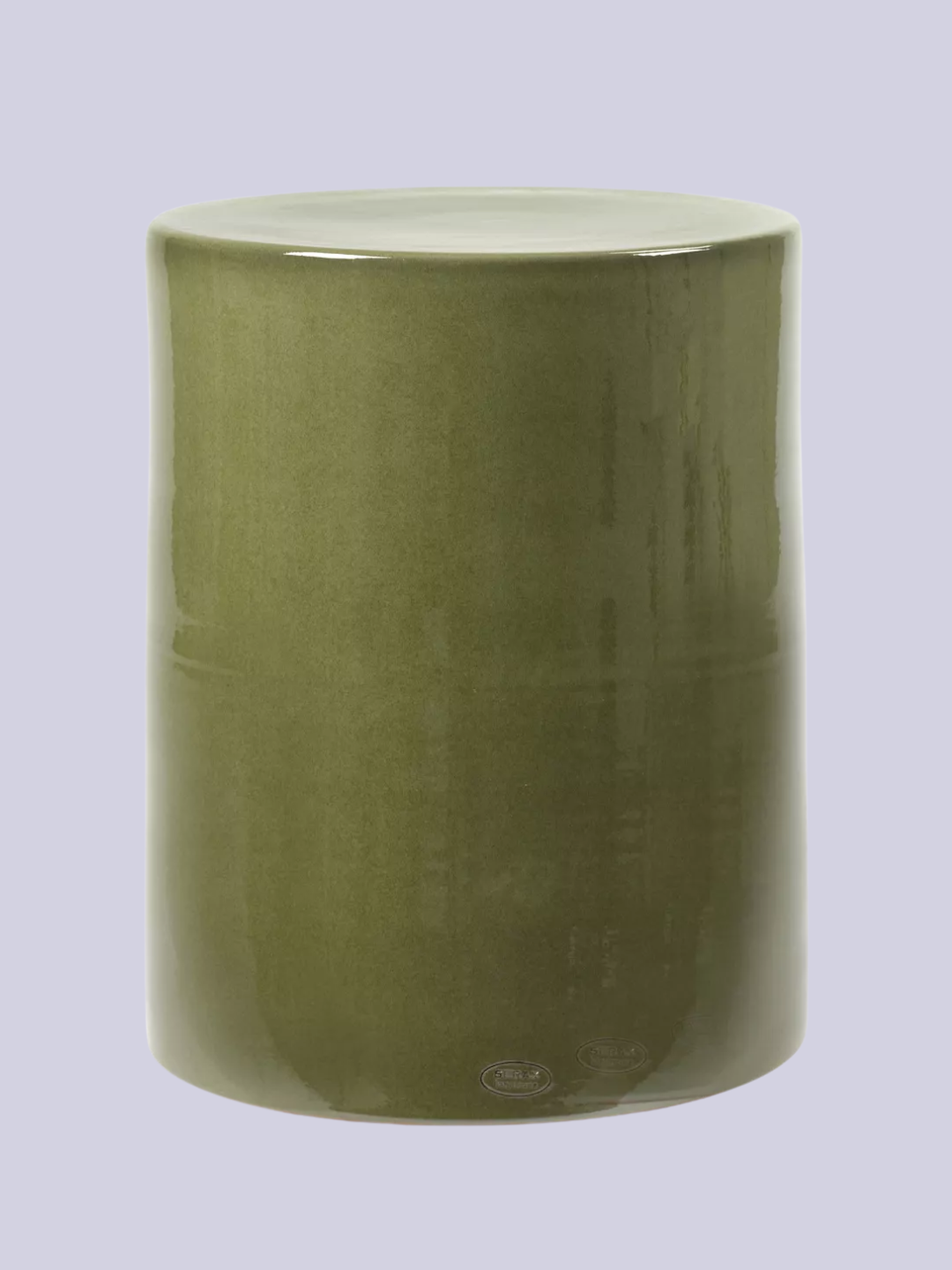 A glazed green side table from SERAX by Marie Michielssen