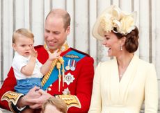 LONDON, UNITED KINGDOM - JUNE 08: (EMBARGOED FOR PUBLICATION IN UK NEWSPAPERS UNTIL 24 HOURS AFTER CREATE DATE AND TIME) Prince William, Duke of Cambridge, Catherine, Duchess of Cambridge and Prince Louis of Cambridge watch a flypast from the balcony of Buckingham Palace during Trooping The Colour, the Queen's annual birthday parade, on June 8, 2019 in London, England. The annual ceremony involving over 1400 guardsmen and cavalry, is believed to have first been performed during the reign of King Charles II. The parade marks the official birthday of the Sovereign, although the Queen's actual birthday is on April 21st. (Photo by Max Mumby/Indigo/Getty Images)