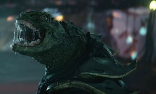 A snarling alien lizard creature with sharp teeth