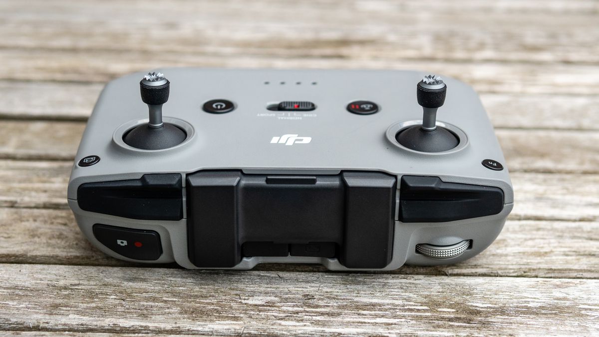 A controller for the DJI Air 2S drone on a wooden table