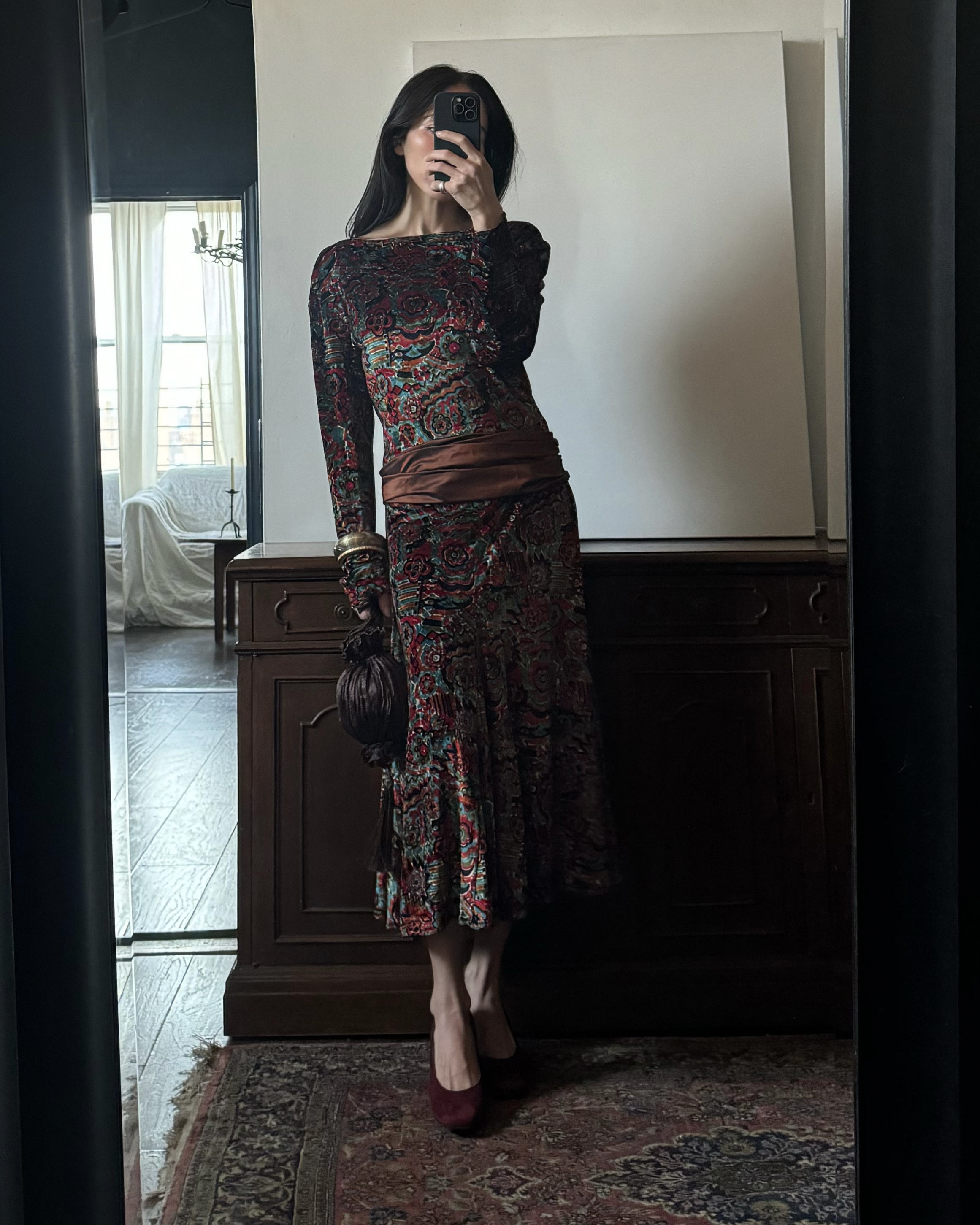 Alexis Badiyi wearing a printed dress