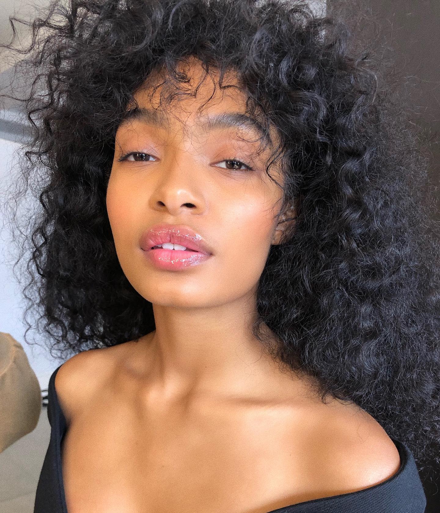 Yara Shahidi with curly fringe