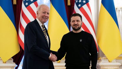 President Biden shakes hands with Ukrainian President Zelensky in Kyiv on February 20, 2023