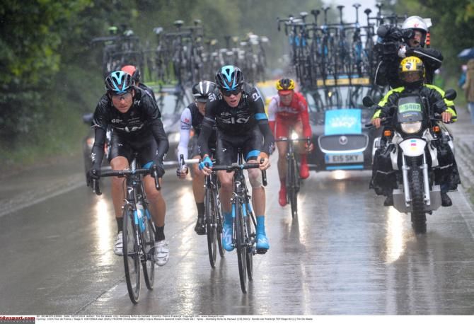 Chris Froome (Team Sky) being being paced back to the peloton