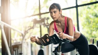 Woman working out on spin bike