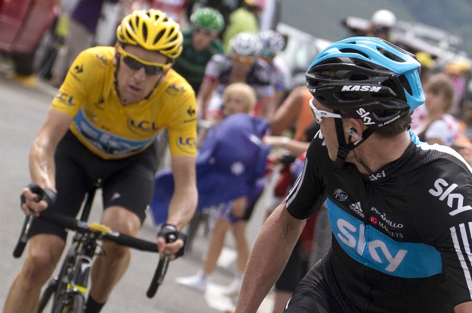 Chris Froome looks round at Bradley Wiggins at the Tour de France