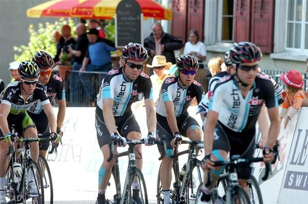 Spidertech riders bunch together at stage six of the Tour de Suisse