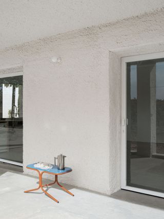 white walls in outside terrace at spanish countryside house