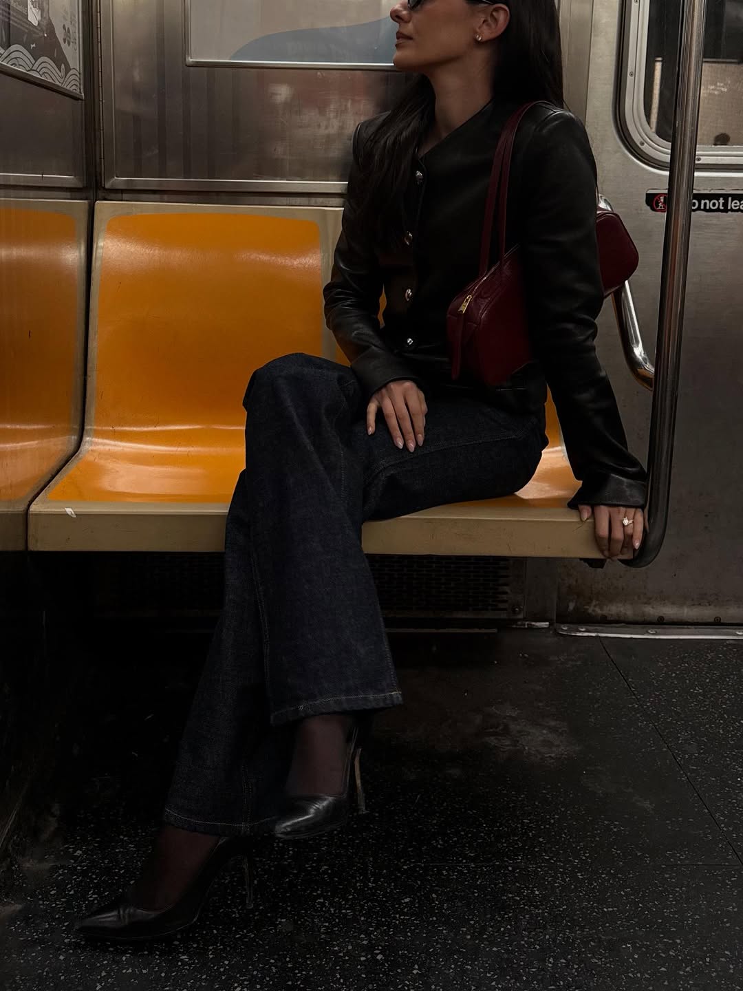 woman wearing heels with jeans spring outfit 2026