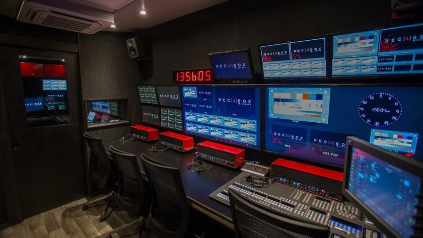 Riedel solutions power a revamped control room shown here with colorful monitors alit. 