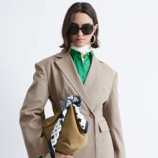 a model wearing clothes from the &other stories pre-spring 2026 collection