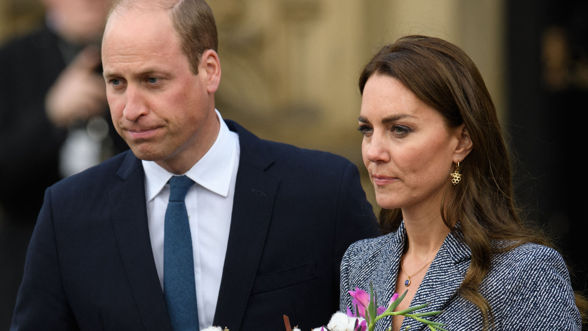 Prince William and Kate Middleton look somber