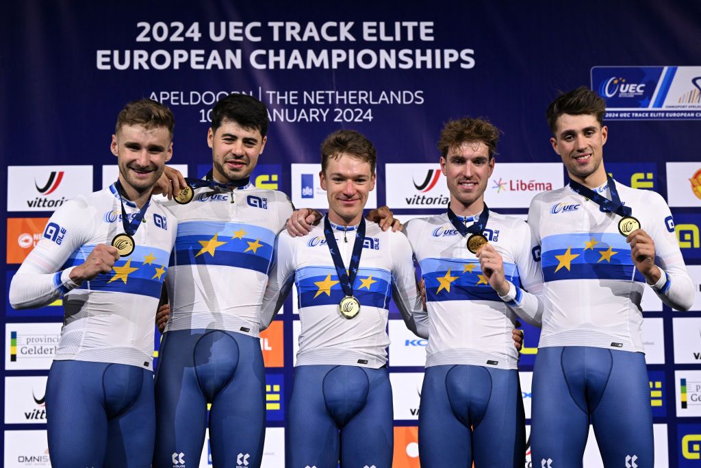 Daniel Bigham, Charlie Tanfield, Ethan Hayter, Oliver Wood, Ethan Vernon celebrate with gold medals on the podium for the Men&#039;s Team Pursuit finals 