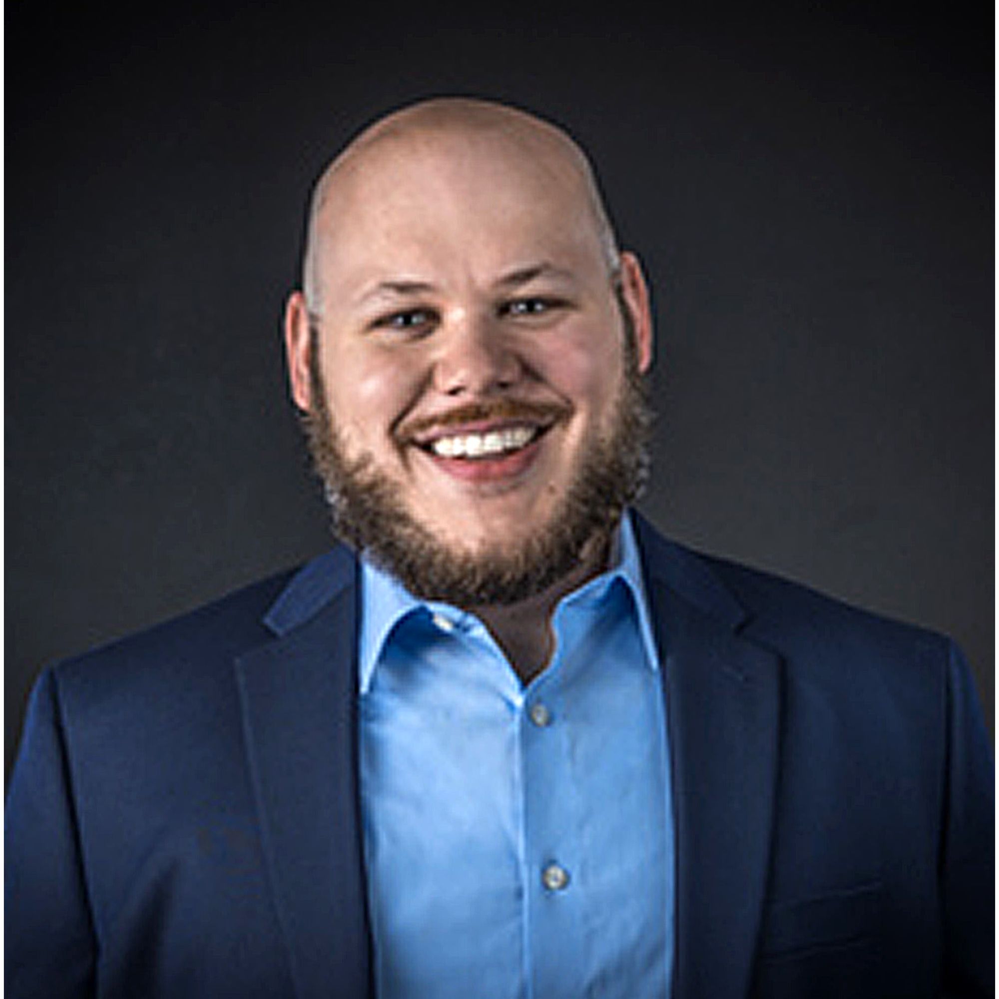 A headshot of Brandon Runyon