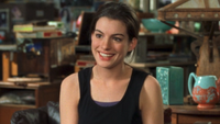 Anne Hathaway smiling as Mia Thermopolis with a tank top on in The Princess Diaries