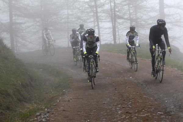 Denis Menchov (left) sets the pace