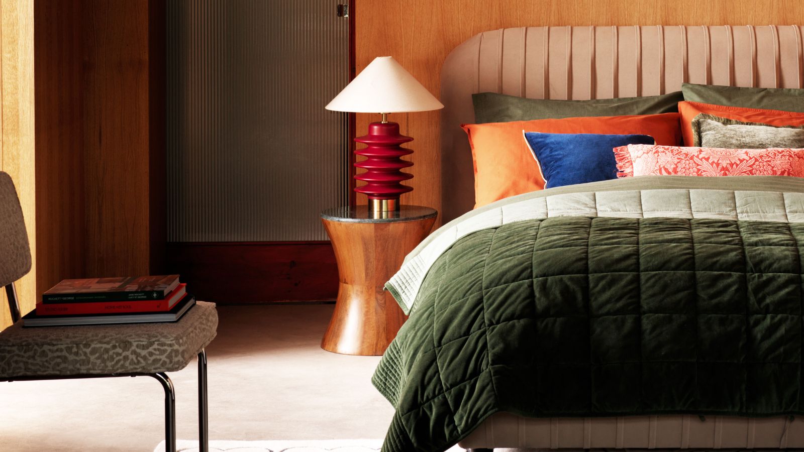 colorful bedroom with round bedside table