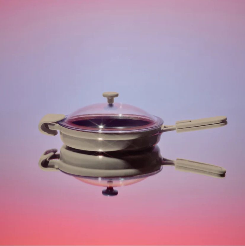 Our Place Always Pan dengan latar belakang merah muda dan ungu.