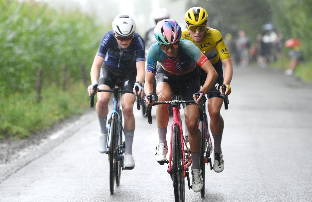 LIEGE BELGIUM AUGUST 14 LR Puck Pieterse of The Netherlands and Team FenixDeceuninck Katarzyna Niewiadoma of Poland and Team CanyonSRAM Racing and Demi Vollering of The Netherlands and Team SD Worx Protime Yellow Lader Jersey compete in the breakaway during the 3rd Tour de France Femmes 2024 Stage 4 a 1227km stage from Valkenburg to Liege UCIWWT on August 14 2024 in Liege Belgium Photo by Alex BroadwayGetty Images