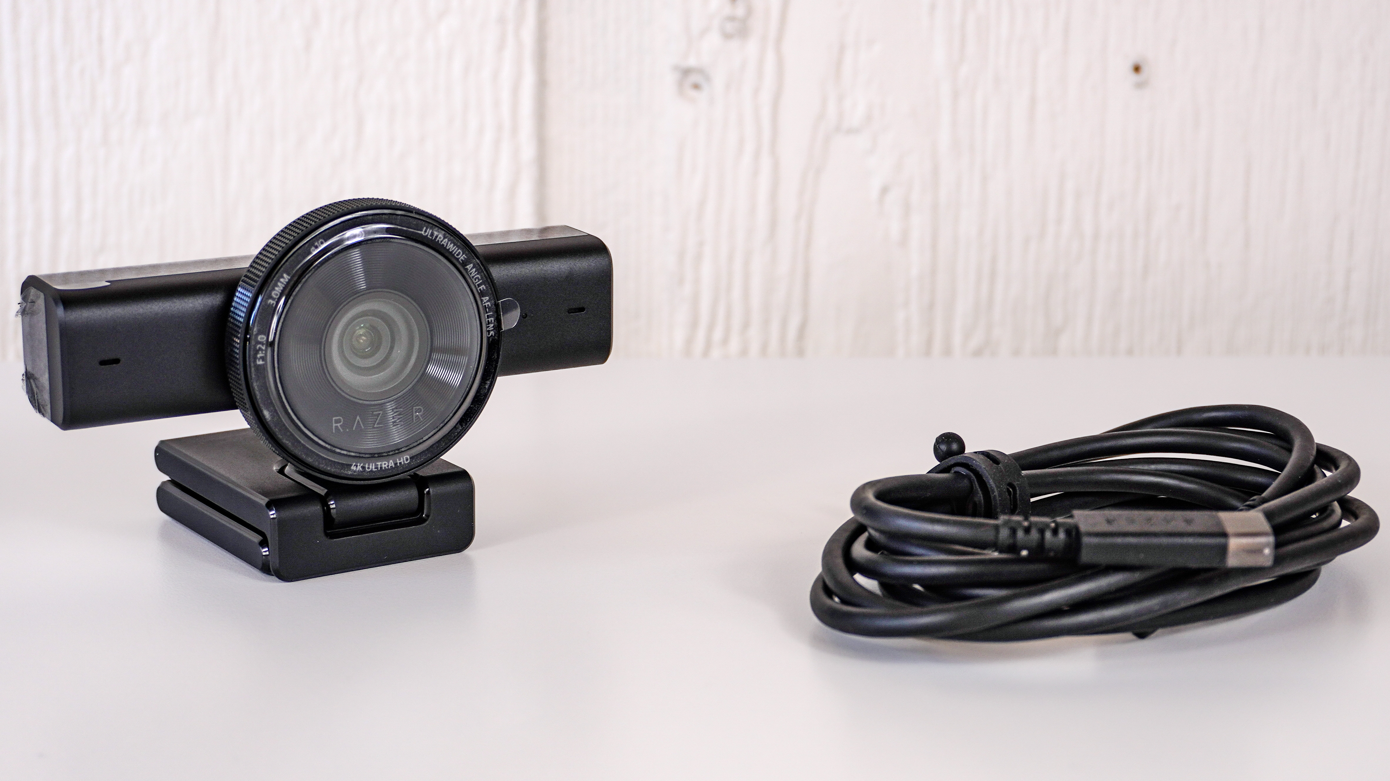 The Razer Kiyo V2 webcam unboxed on a table