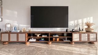 extra-wide media console unit with natural doors and round feet
