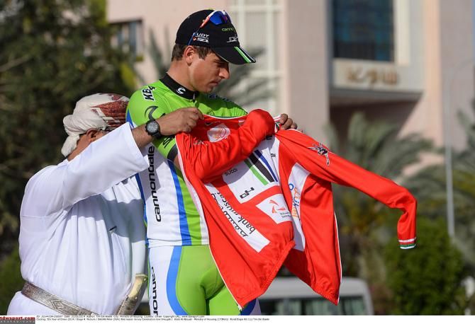 Peter Sagan dons the red leader's jersey