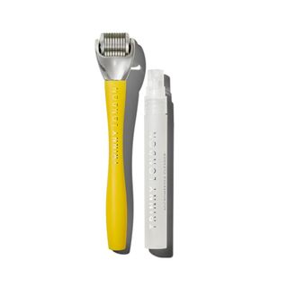 A yellow Trinny London Plump Up Microneedling tool.