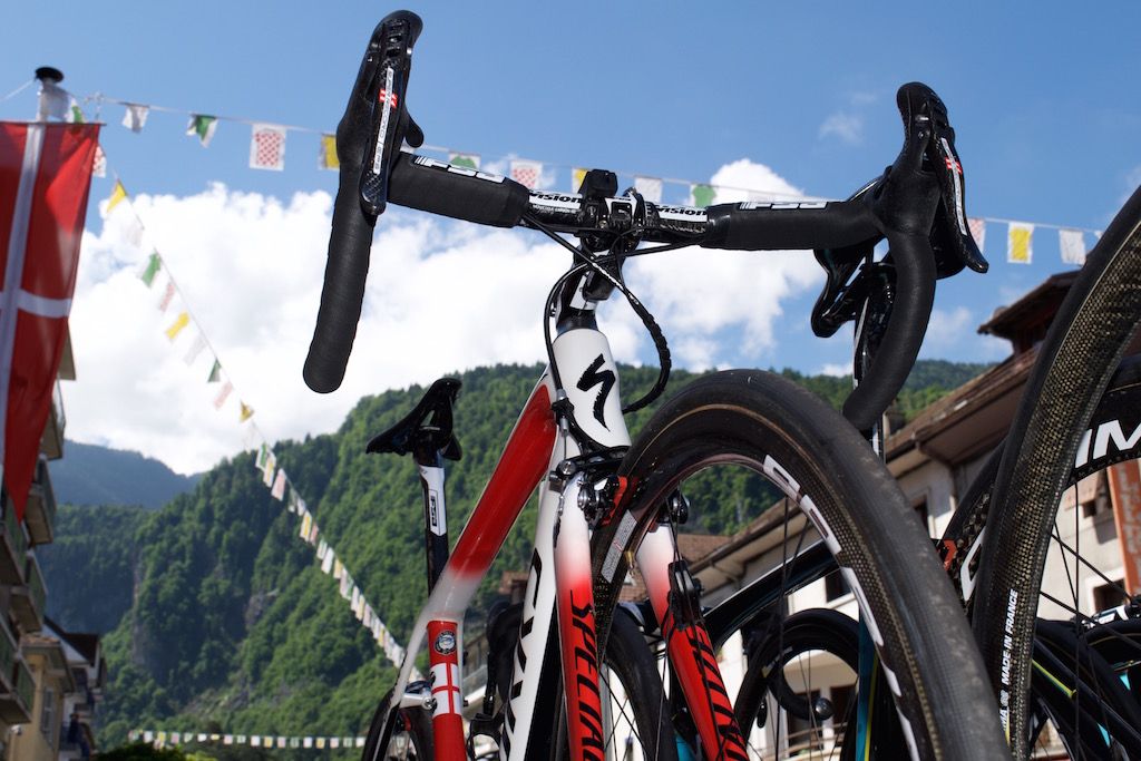 Aru's spare bike is also red and white