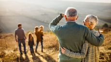 A family going for a walk on a sunny day