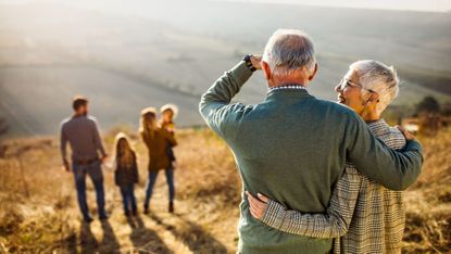 A family going for a walk on a sunny day