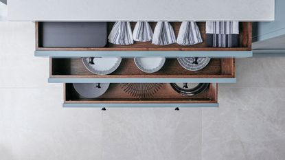overhead of open kitchen drawers