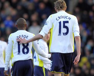 A photo taken from behind of Jermain Defoe and Peter Crouch side by side, playing for Tottenham, 2010