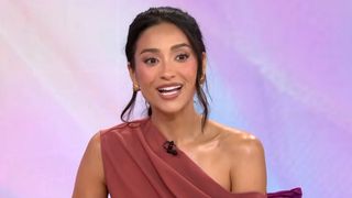 A screen shot of Shay Mitchell smiling in a one-shoulder top on Today with Jenna & Sheinelle.