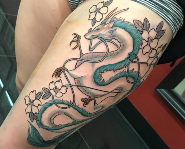 Whimsical dragon tattoo