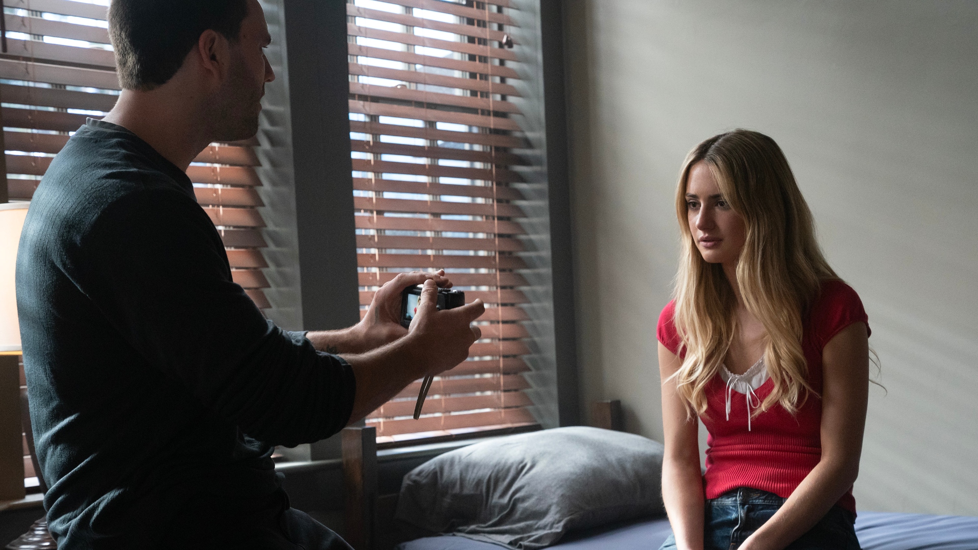 Stephen points a camera at Lucy in Tell Me Lies season 3