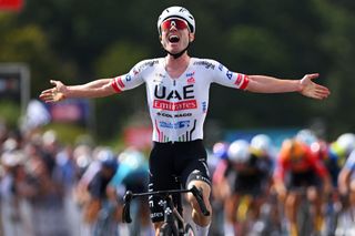 PLOUAY FRANCE AUGUST 25 Marc Hirschi of Switzerland and UAE Team Emirates celebrates at finish line as race winner during the 93rd Bretagne Classic OuestFrance 2024 a 2598km one day race from Plouay to Plouay UCIWT on August 25 2024 in Plouay France Photo by Luc ClaessenGetty Images