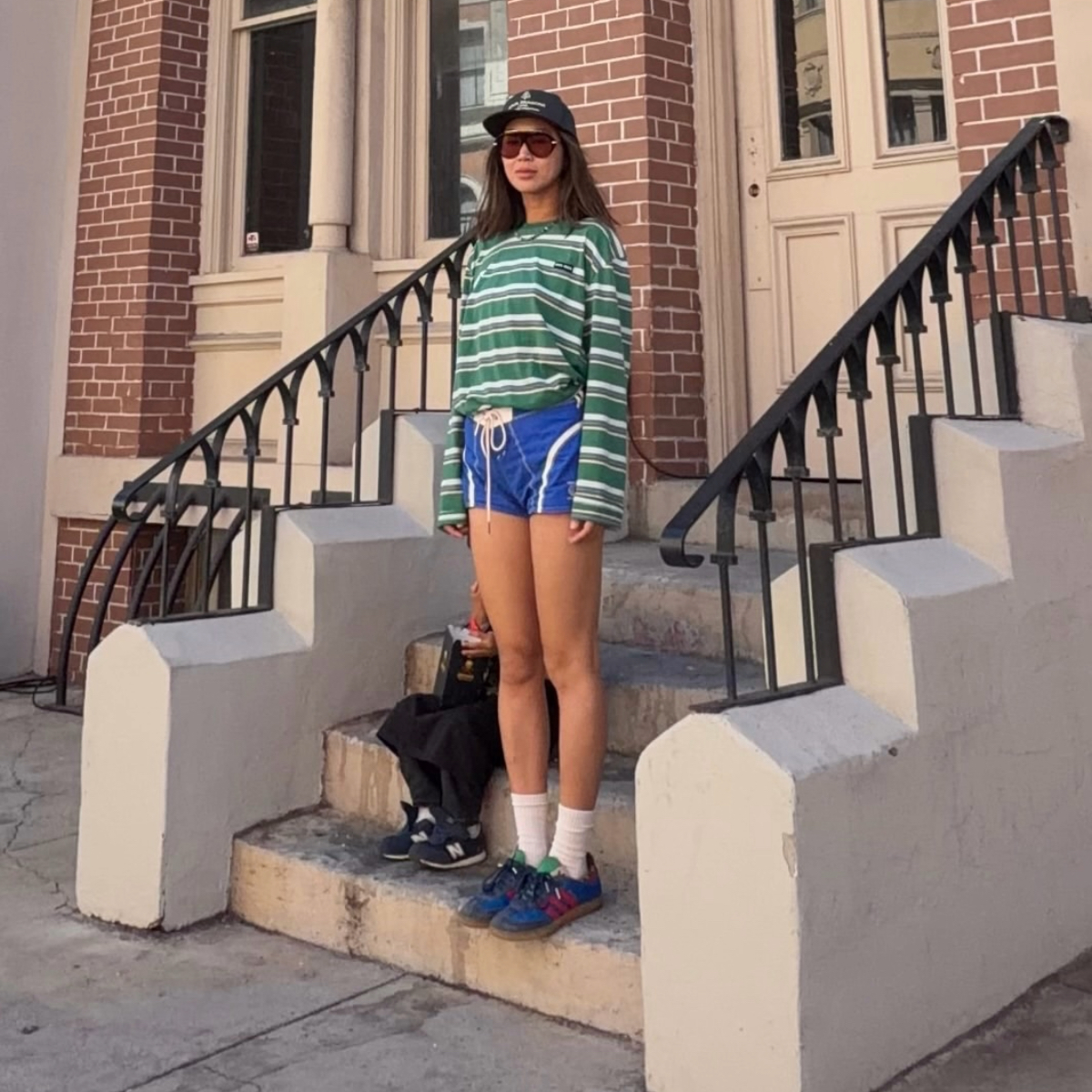 Aimee Song in a striped tee
