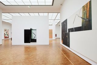 Installation view of ‘Wade Guyton: Zwei Dekaden MCMXCIX–MMXIX’ at Museum Ludwig, Cologne