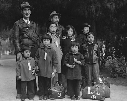 Photograph of Members of the Mochida Family Awaiting Evacuation, 1942