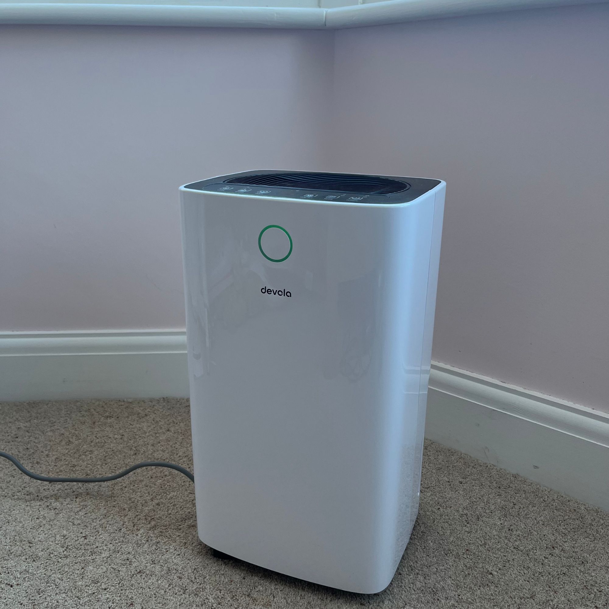 Devola 12L Compressor Dehumidifier in a bedroom