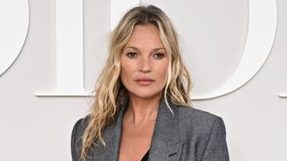 Kate Moss is pictured with wavy blonde hair whilst attending the Dior Homme Menswear Spring/Summer 2025 show as part of Paris Fashion Week on June 21, 2024 in Paris, France.