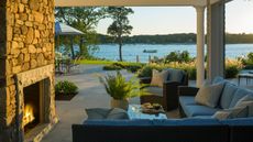 Outdoor living room fireplace in early fall