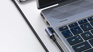 UGREEN Right Angle 100W USB-C Cable charging a Chromebook