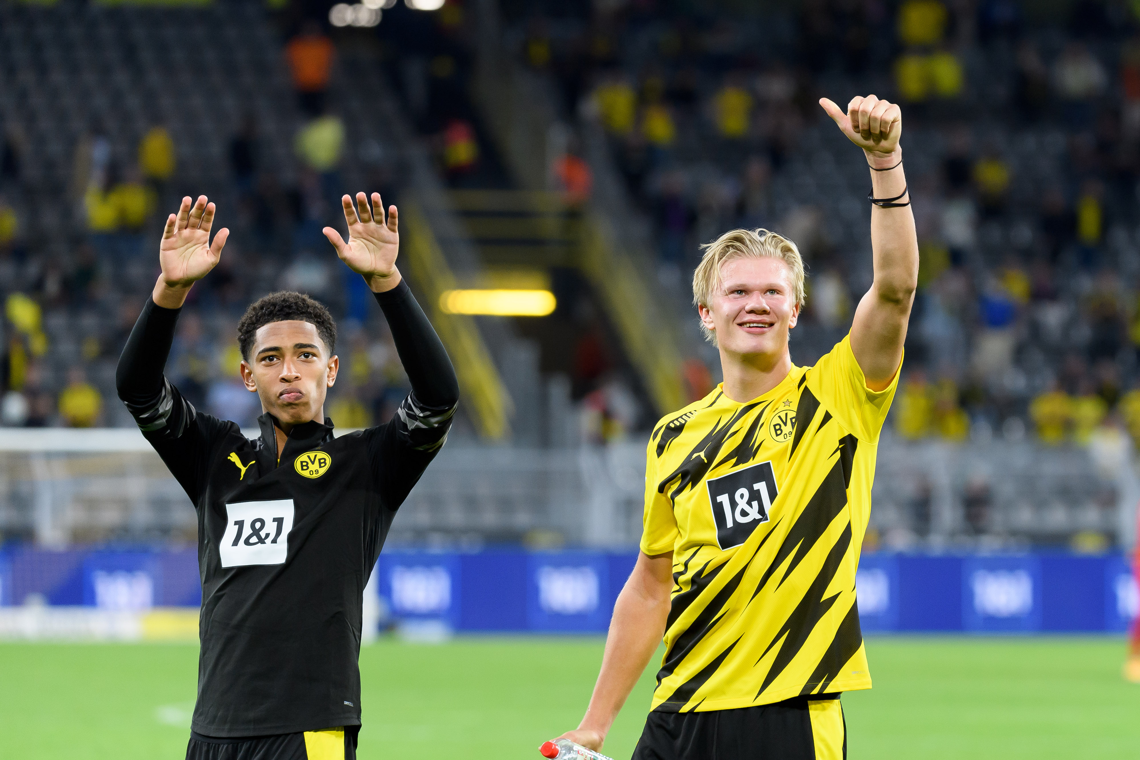 DORTMUND, GERMANY - SEPTEMBER 19: (BILD ZEITUNG OUT) Jude Bellingham of Borussia Dortmund and Erling Haaland of Borussia Dortmund celebrate after winning the Bundesliga match between Borussia Dortmund and Borussia Moenchengladbach at Signal Iduna Park on September 19, 2020 in Dortmund, Germany. Fans are set to return to Bundesliga stadiums in Germany despite to the ongoing Coronavirus Pandemic. Up to 20% of stadium&amp;apos;s capacity are allowed to be filled. Final decisions are left to local health authorities and are subject to club&amp;apos;s hygiene concepts and the infection numbers in the corresponding region. (Photo by Alex Gottschalk/DeFodi Images via Getty Images)