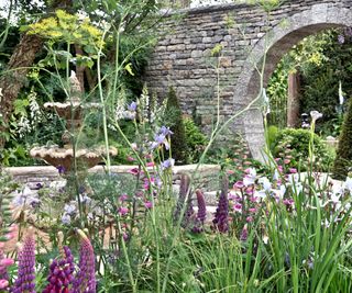 sustainable landscaping with natural stone and flowers